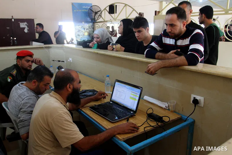 Palestinians wait permission to enter Egypt as they gather at the Rafah border crossing in the southern Gaza Strip on on November 15, 2016. Egypt is due to reopen its Rafah border crossing with Gaza for Five days. Photo...