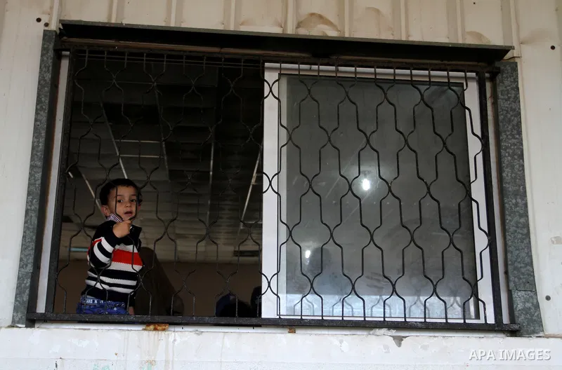 Palestinians wait permission to enter Egypt as they gather at the Rafah border crossing in the southern Gaza Strip on on November 15, 2016. Egypt is due to reopen its Rafah border crossing with Gaza for Five days. Photo...