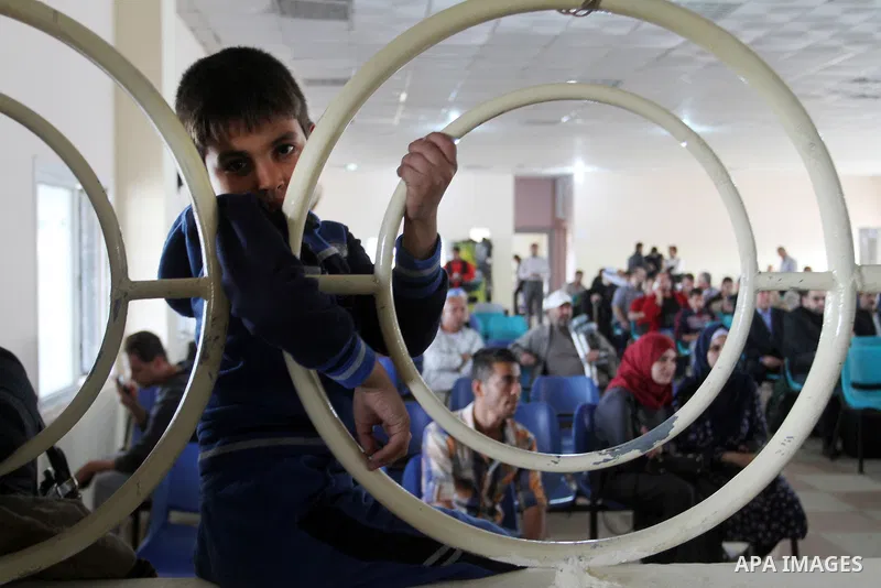 Palestinians wait permission to enter Egypt as they gather at the Rafah border crossing in the southern Gaza Strip on on November 15, 2016. Egypt is due to reopen its Rafah border crossing with Gaza for Five days. Photo...