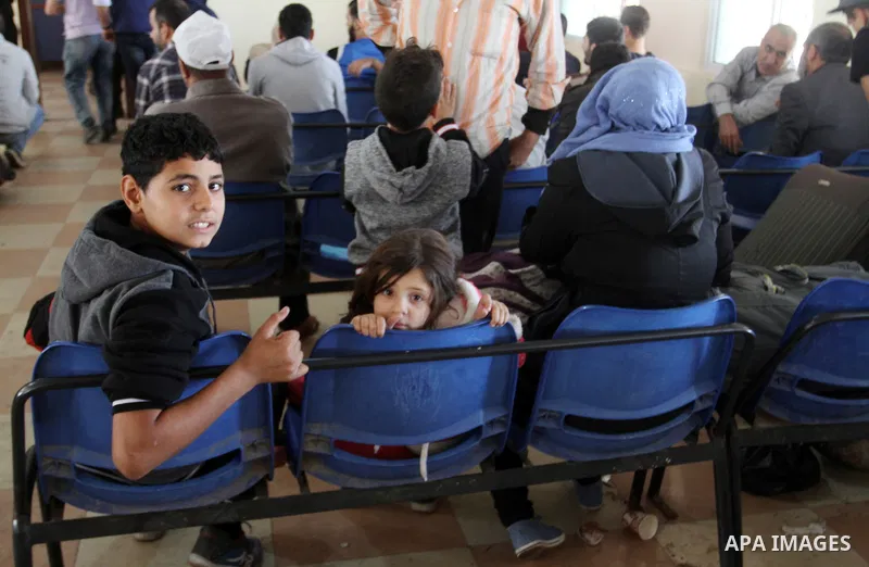 Palestinians wait permission to enter Egypt as they gather at the Rafah border crossing in the southern Gaza Strip on on November 15, 2016. Egypt is due to reopen its Rafah border crossing with Gaza for Five days. Photo...