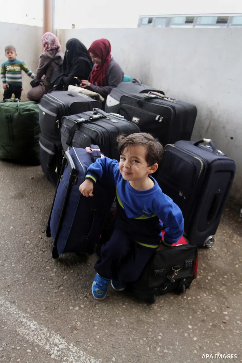 Palestinians wait permission to enter Egypt as they gather at the Rafah border crossing in the southern Gaza Strip on on November 15, 2016. Egypt is due to reopen its Rafah border crossing with Gaza for Five days. Photo...