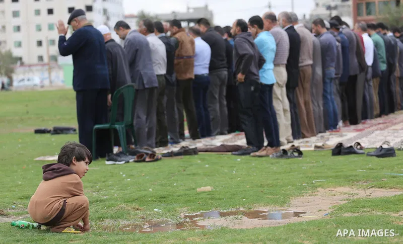 Palestinians pray for rain at al-Kateba square in Gaza City on November 16, 2016. The Ministry of Awqaf and Religious Affairs have held special prayers to invoke God for rain. The special Muslim prayers known as Salat al...