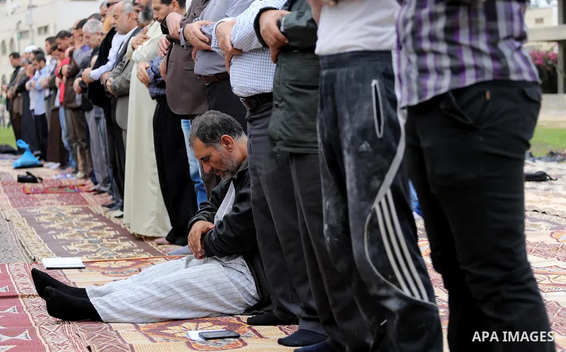 Palestinians pray for rain at al-Kateba square in Gaza City on November 16, 2016. The Ministry of Awqaf and Religious Affairs have held special prayers to invoke God for rain. The special Muslim prayers known as Salat al...