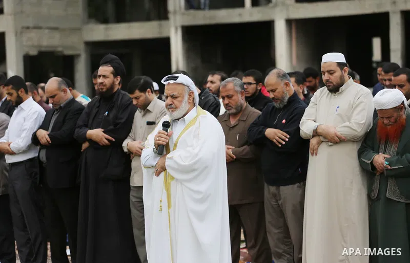 Palestinians pray for rain at al-Kateba square in Gaza City on November 16, 2016. The Ministry of Awqaf and Religious Affairs have held special prayers to invoke God for rain. The special Muslim prayers known as Salat al...