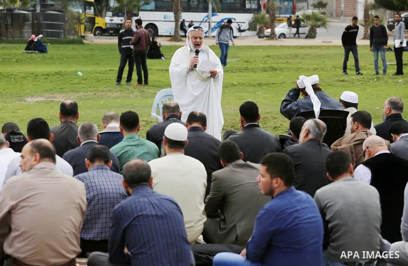 Palestinians pray for rain at al-Kateba square in Gaza City on November 16, 2016. The Ministry of Awqaf and Religious Affairs have held special prayers to invoke God for rain. The special Muslim prayers known as Salat al...
