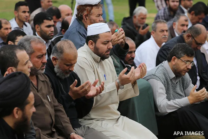 Palestinians pray for rain at al-Kateba square in Gaza City on November 16, 2016. The Ministry of Awqaf and Religious Affairs have held special prayers to invoke God for rain. The special Muslim prayers known as Salat al...