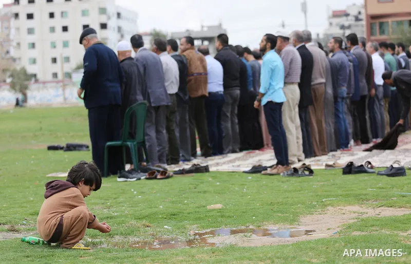 Palestinians pray for rain at al-Kateba square in Gaza City on November 16, 2016. The Ministry of Awqaf and Religious Affairs have held special prayers to invoke God for rain. The special Muslim prayers known as Salat al...