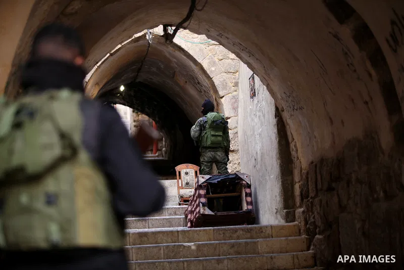 Members of the Palestinian security forces patrol in the West Bank city of Nablus on November 16, 2016. A Palestinian woman was killed and three Palestinian security officers were injured during armed clashes with suspec...