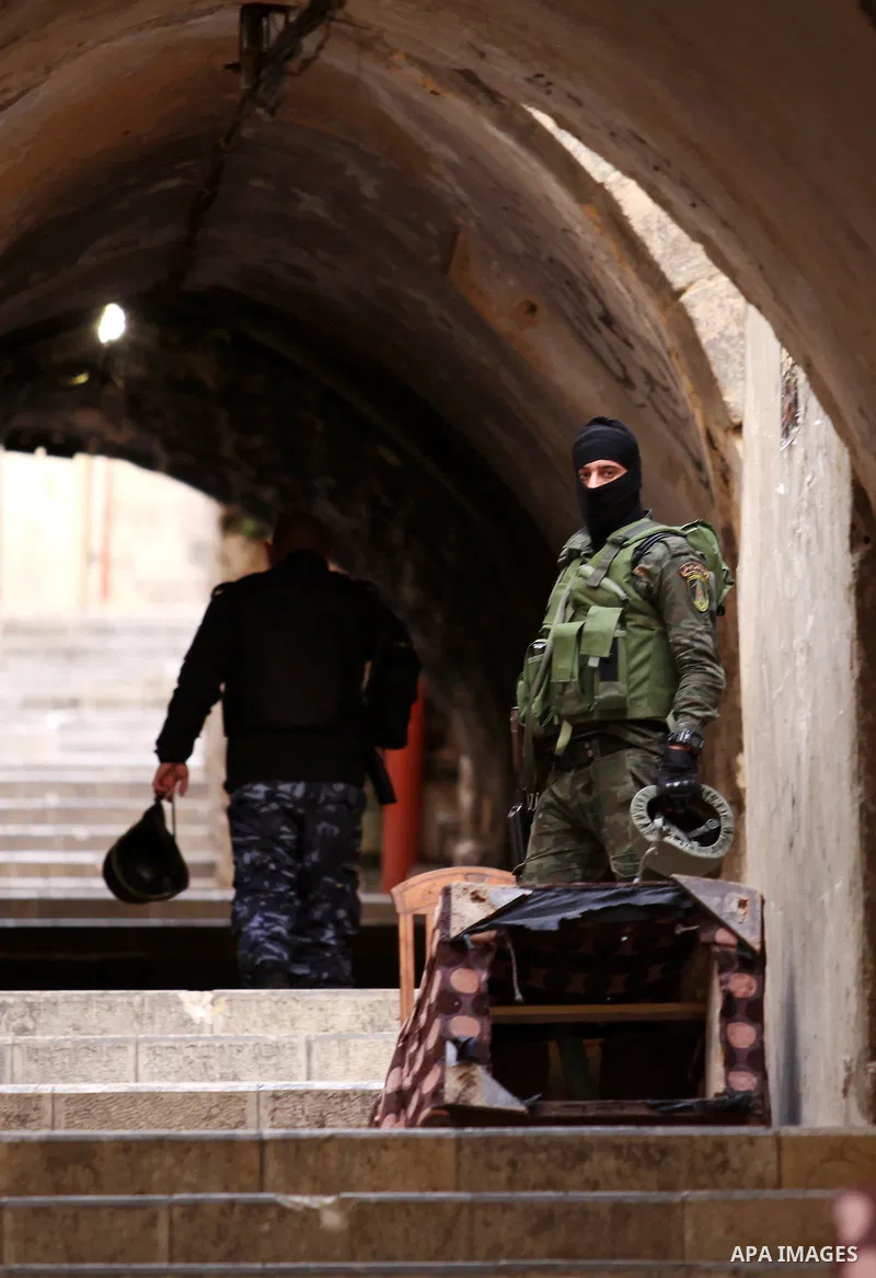 Members of the Palestinian security forces patrol in the West Bank city of Nablus on November 16, 2016. A Palestinian woman was killed and three Palestinian security officers were injured during armed clashes with suspec...