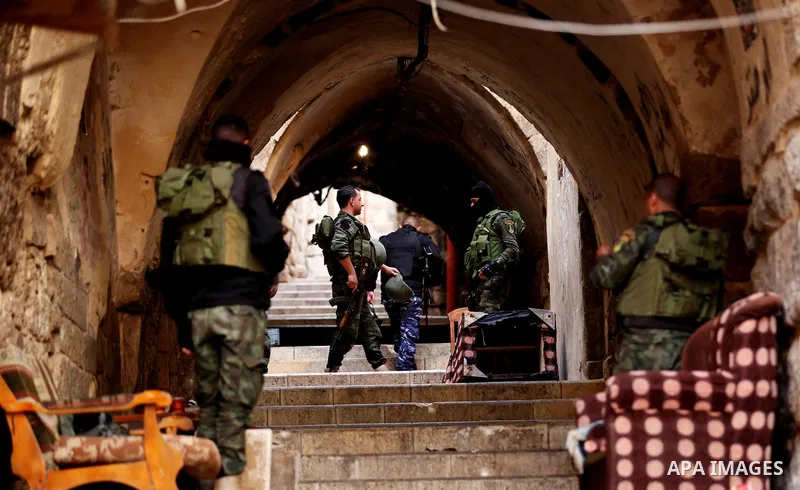 Members of the Palestinian security forces patrol in the West Bank city of Nablus on November 16, 2016. A Palestinian woman was killed and three Palestinian security officers were injured during armed clashes with suspec...