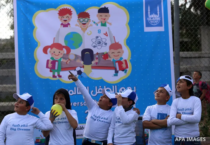 Palestinian children take part in a festival to mark " World Children's Day" in Gaza City, on November 17, 2016. Photo by Yasser Qudih