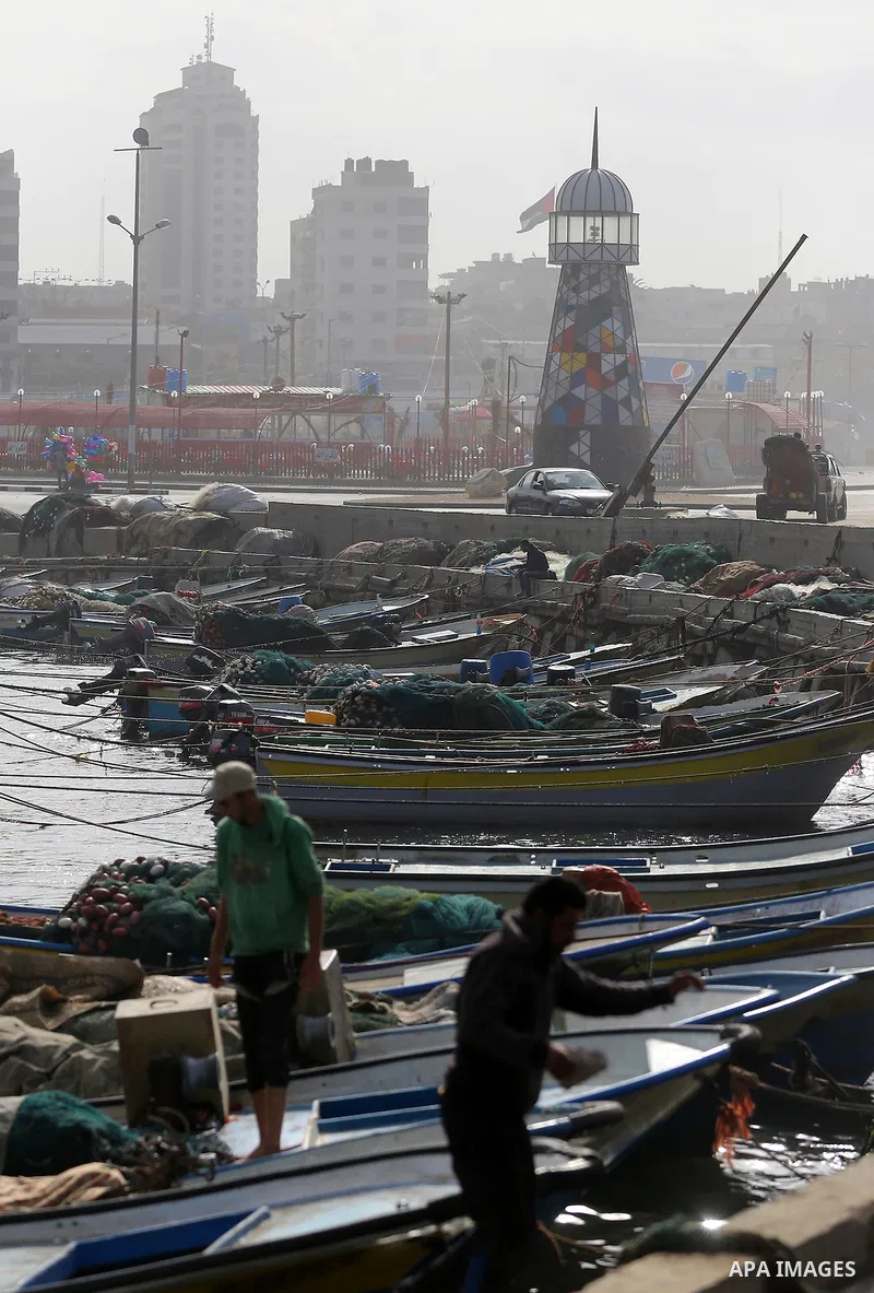 Boats are seen anchored at the Gaza seaport, on November 17, 2016. Photo by Yasser Qudih
