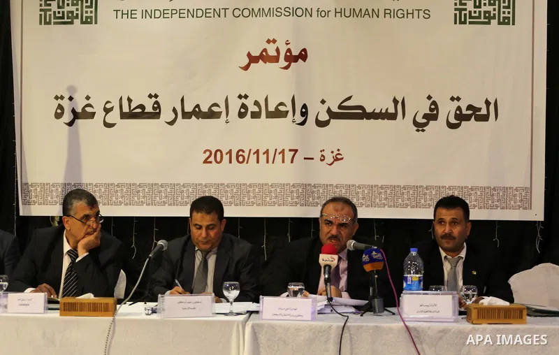 Palestinian members of the Independent Commission for Human Rights, take part in the press conference about the "right to housing and the reconstruction of the Gaza Strip, in Gaza City, on November 17, 2016. Photo by Moh...