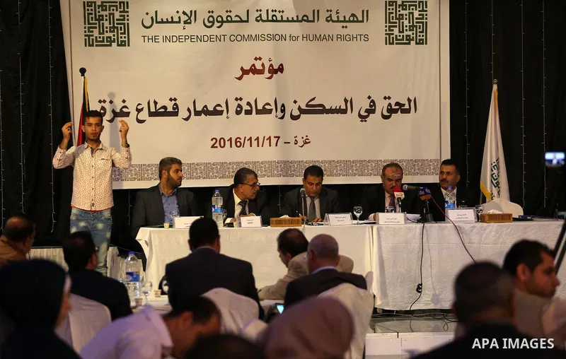 Palestinian members of the Independent Commission for Human Rights, take part in the press conference about the "right to housing and the reconstruction of the Gaza Strip, in Gaza City, on November 17, 2016. Photo by Moh...