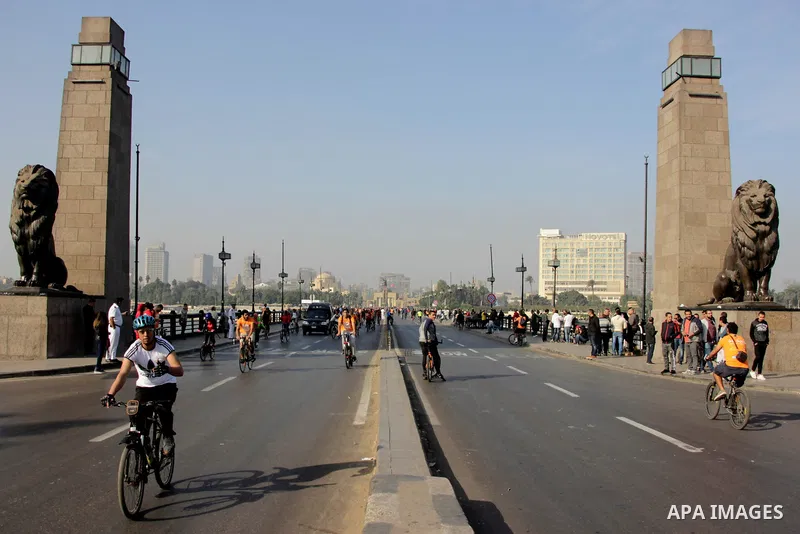 Egyptians ride their bicycles during the annual event known as 'Orange Bike Day', organized by Netherlands' Embassy to Cairo to highlight environment friendly transport, in Cairo, Egypt on November 18, 2016. Photo by Amr...