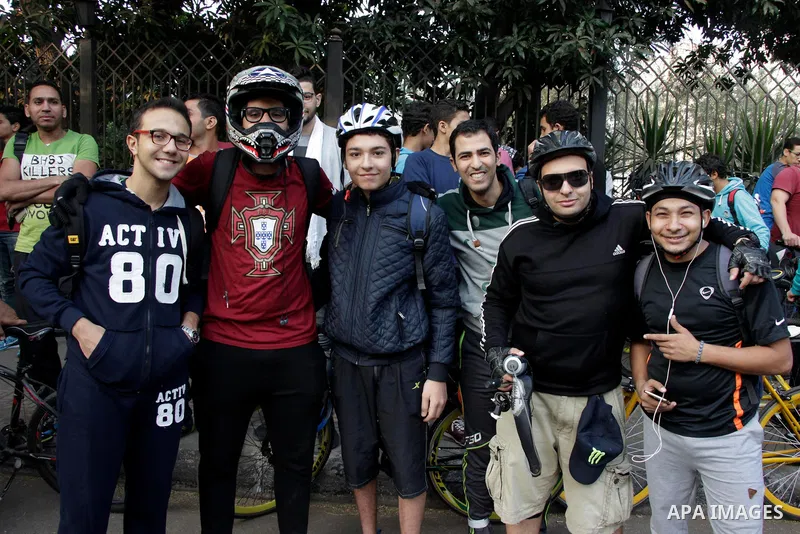 Egyptians take part during the annual event known as 'Orange Bike Day', organized by Netherlands' Embassy to Cairo to highlight environment friendly transport, in Cairo, Egypt on November 18, 2016. Photo by Amr Sayed