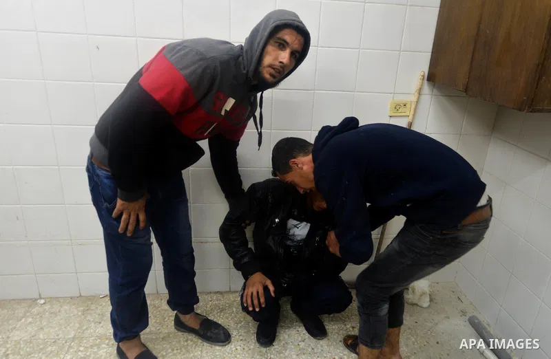Relatives react after seeing the body of Mohammed Abu Saada, a 26-year-old Palestinian man who was reportedly killed in clashes with the Israeli army along the Gaza border, at a morgue in Deir al-Balah in central Gaza on...