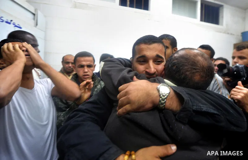 Relatives react after seeing the body of Mohammed Abu Saada, a 26-year-old Palestinian man who was reportedly killed in clashes with the Israeli army along the Gaza border, at a morgue in Deir al-Balah in central Gaza on...