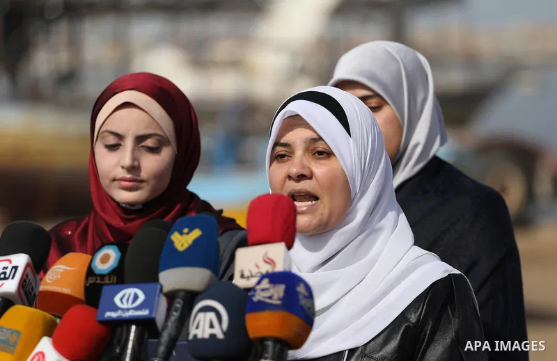 Spokesman of the National Commission to break the siege Mona Skaik, speaks during a press conference at the seaport in Gaza city on November 19, 2016. Photo by Mohammed Asad