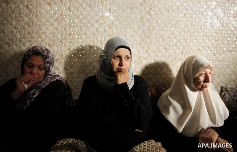 Relatives of Mohammed Abu Saada, a 26-year-old Palestinian man who was reportedly killed in clashes with the Israeli army along the Gaza border, mourn during his funeral in the Nuseirat refugee camp in the central Gaza S...