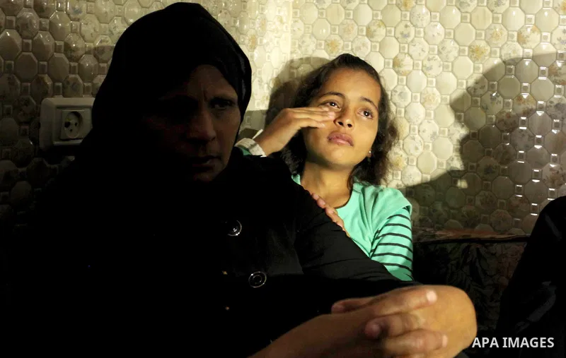 Relatives of Mohammed Abu Saada, a 26-year-old Palestinian man who was reportedly killed in clashes with the Israeli army along the Gaza border, mourn during his funeral in the Nuseirat refugee camp in the central Gaza S...