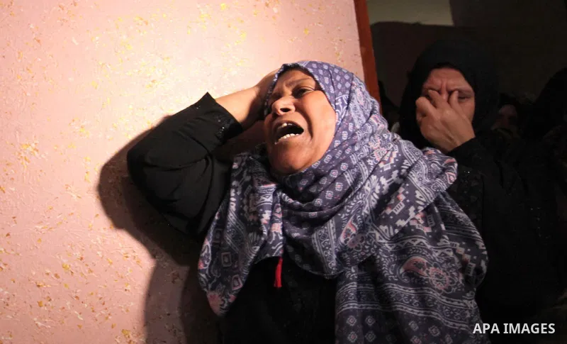 Relatives of Mohammed Abu Saada, a 26-year-old Palestinian man who was reportedly killed in clashes with the Israeli army along the Gaza border, mourn during his funeral in the Nuseirat refugee camp in the central Gaza S...