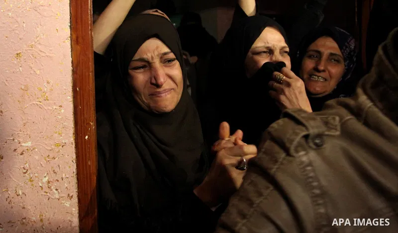Relatives of Mohammed Abu Saada, a 26-year-old Palestinian man who was reportedly killed in clashes with the Israeli army along the Gaza border, mourn during his funeral in the Nuseirat refugee camp in the central Gaza S...