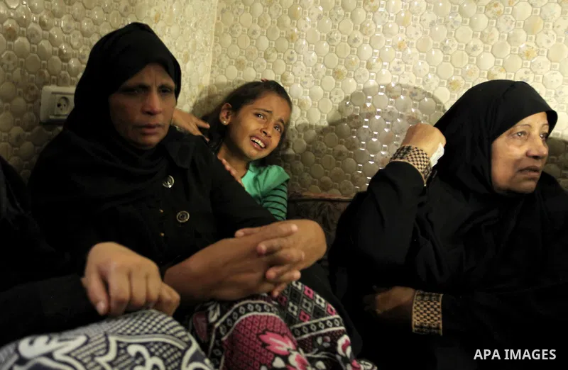 Relatives of Mohammed Abu Saada, a 26-year-old Palestinian man who was reportedly killed in clashes with the Israeli army along the Gaza border, mourn during his funeral in the Nuseirat refugee camp in the central Gaza S...