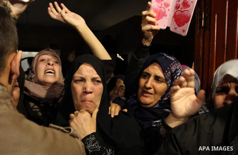 Relatives of Mohammed Abu Saada, a 26-year-old Palestinian man who was reportedly killed in clashes with the Israeli army along the Gaza border, mourn during his funeral in the Nuseirat refugee camp in the central Gaza S...