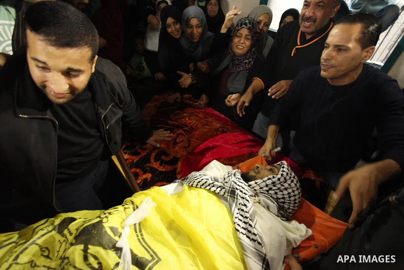 Relatives of Mohammed Abu Saada, a 26-year-old Palestinian man who was reportedly killed in clashes with the Israeli army along the Gaza border, mourn during his funeral in the Nuseirat refugee camp in the central Gaza S...