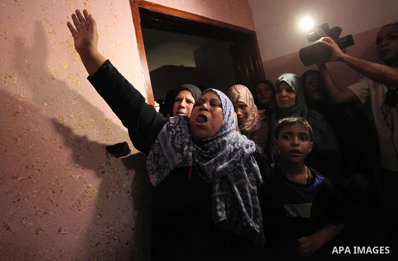 Relatives of Mohammed Abu Saada, a 26-year-old Palestinian man who was reportedly killed in clashes with the Israeli army along the Gaza border, mourn during his funeral in the Nuseirat refugee camp in the central Gaza S...