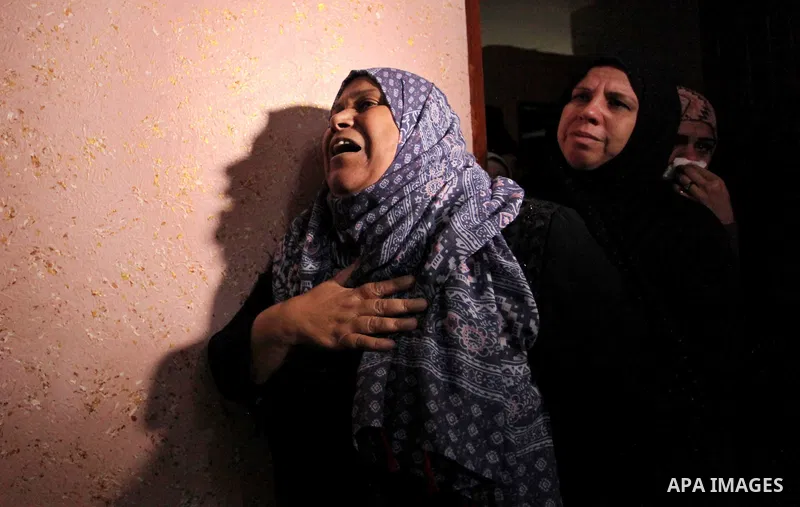 Relatives of Mohammed Abu Saada, a 26-year-old Palestinian man who was reportedly killed in clashes with the Israeli army along the Gaza border, mourn during his funeral in the Nuseirat refugee camp in the central Gaza S...