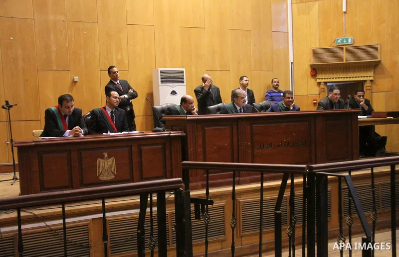 Judges attend the trial of Alaa and Gamal Mubarak, the sons of former former president Hosni Mubarak in Cairo on November 19, 2016. Cairo Criminal Court held at Police Academy adjourned Gamal and Alaa Mubarak trial in ''...