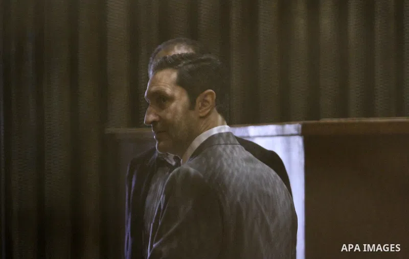 Alaa and Gamal Mubarak, the sons of former former president Hosni Mubarak sit in a courtroom cage during their trial on November 19, 2016. Cairo Criminal Court held at Police Academy adjourned Gamal and Alaa Mubarak tria...