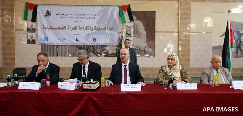 Palestinian Prime Minister Rami Hamdallah attends international campaign against violence against women, in the West Bank city of Tulkarem, on Nov. 20, 2016. Photo by Prime Minister Office