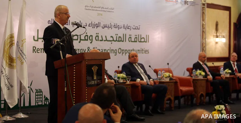 Palestinian Prime Minister, Rami hamdallah, attends the Palestine International Banking Conference, in the West Bank city of Ramallah, on November 21, 2016. Photo by Prime Minister Office