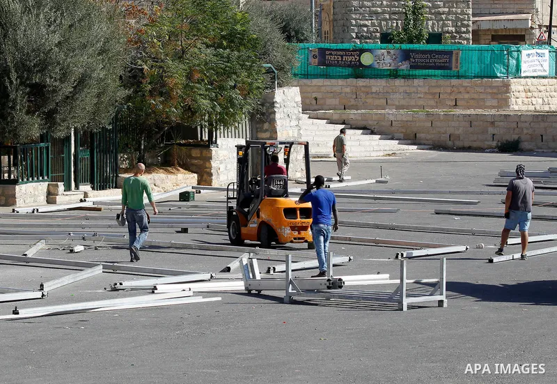 Israeli Workers build barracks in order to Judaize the area near the Ibrahimi mosque, or the Tomb of the Patriarch, a religious site to both Muslims and Jews, in the Israeli occupied West Bank city of Hebron on November...