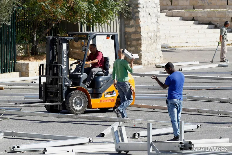 Israeli Workers build barracks in order to Judaize the area near the Ibrahimi mosque, or the Tomb of the Patriarch, a religious site to both Muslims and Jews, in the Israeli occupied West Bank city of Hebron on November...
