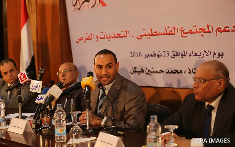 Palestinian Journalists attend a press conference, in Cairo, Egypt, on November 23, 2016. Photo by Yasser Qudih