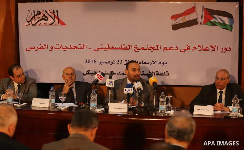 Palestinian Journalists attend a press conference, in Cairo, Egypt, on November 23, 2016. Photo by Yasser Qudih