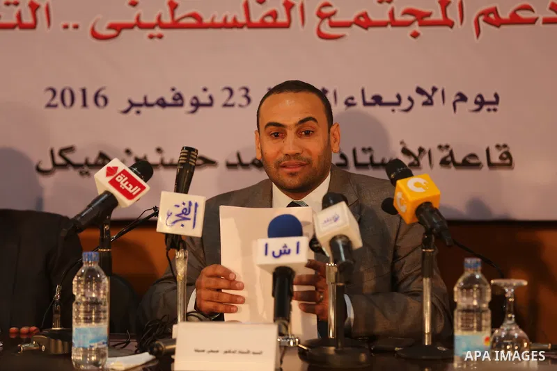 Palestinian Journalists attend a press conference, in Cairo, Egypt, on November 23, 2016. Photo by Yasser Qudih