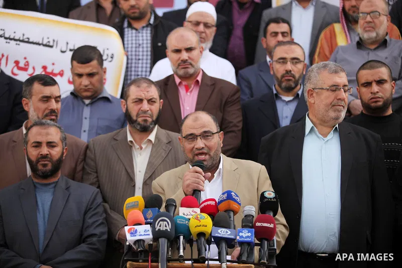 Palestinians hold banners during a protest against a controversial Israeli bill to limit the volume of calls to prayer at mosques in the occupied Jerusalem, in Gaza city on November 23, 2016. Israeli Prime Minister Benja...