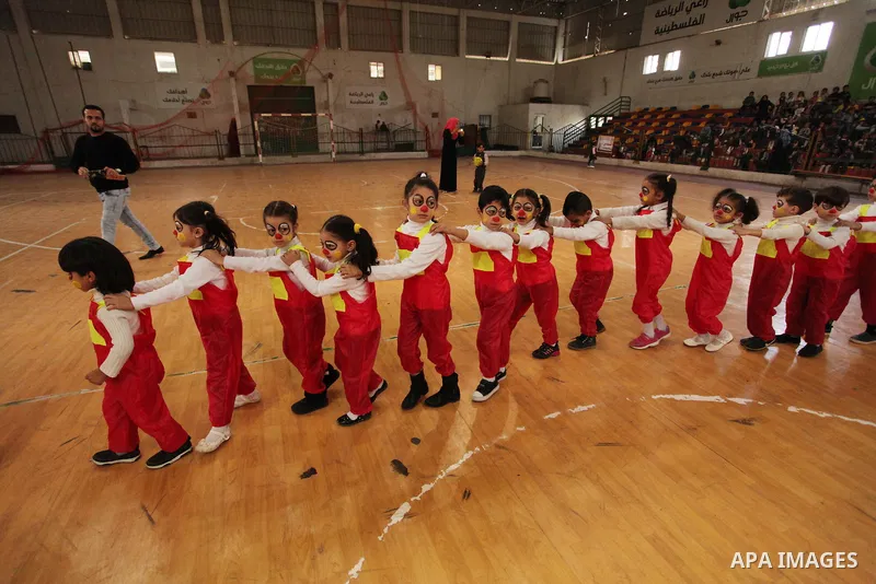 Palestinian children play during an entertaining day to mark the UN Universal Children's Day in Gaza City on November 23, 2016. Photo by Ashraf Amra