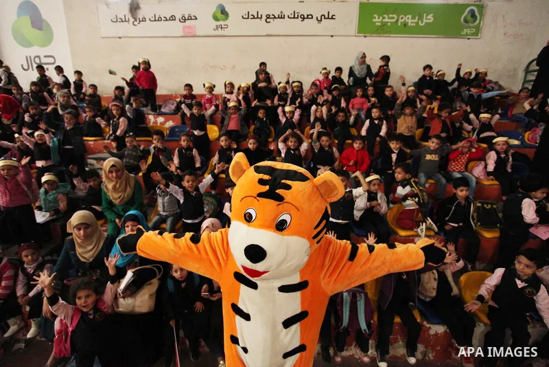 Palestinian children play during an entertaining day to mark the UN Universal Children's Day in Gaza City on November 23, 2016. Photo by Ashraf Amra