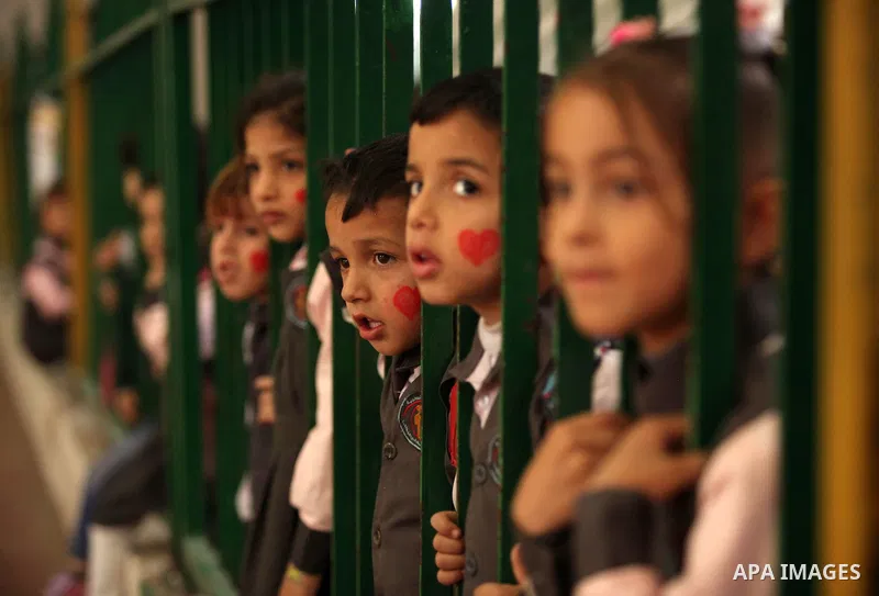 Palestinian children play during an entertaining day to mark the UN Universal Children's Day in Gaza City on November 23, 2016. Photo by Ashraf Amra