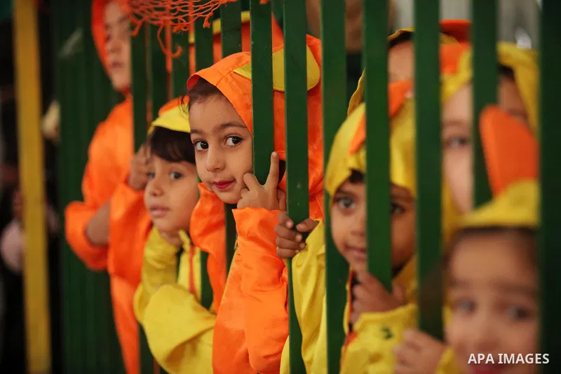 Palestinian children play during an entertaining day to mark the UN Universal Children's Day in Gaza City on November 23, 2016. Photo by Ashraf Amra