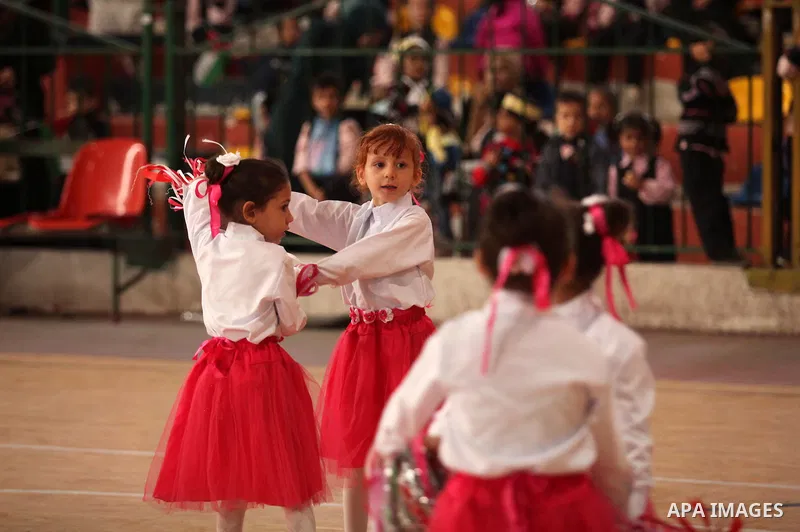 Palestinian children play during an entertaining day to mark the UN Universal Children's Day in Gaza City on November 23, 2016. Photo by Ashraf Amra