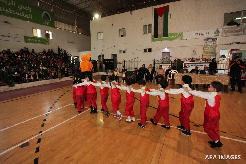 Palestinian children play during an entertaining day to mark the UN Universal Children's Day in Gaza City on November 23, 2016. Photo by Ashraf Amra