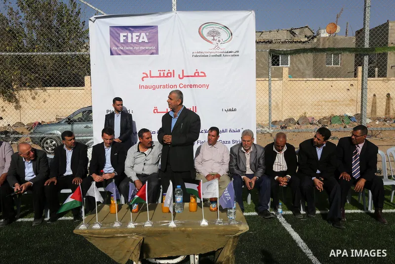 Alexander Gross, the development of FIFA's program in Asia director attends the inauguration ceremony of play field in Gaza city, on Nov. 23, 2016. Photo by Mohammed Asad