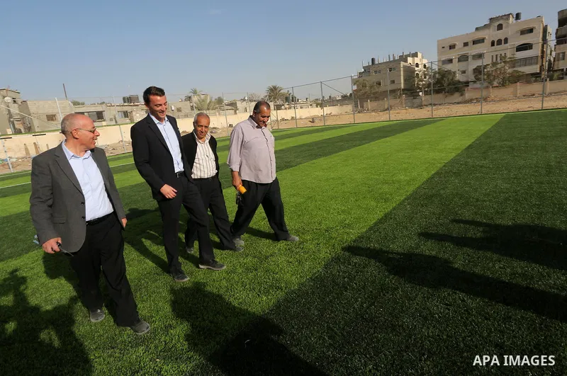 Alexander Gross, the development of FIFA's program in Asia director attends the inauguration ceremony of play field in Gaza city, on Nov. 23, 2016. Photo by Mohammed Asad